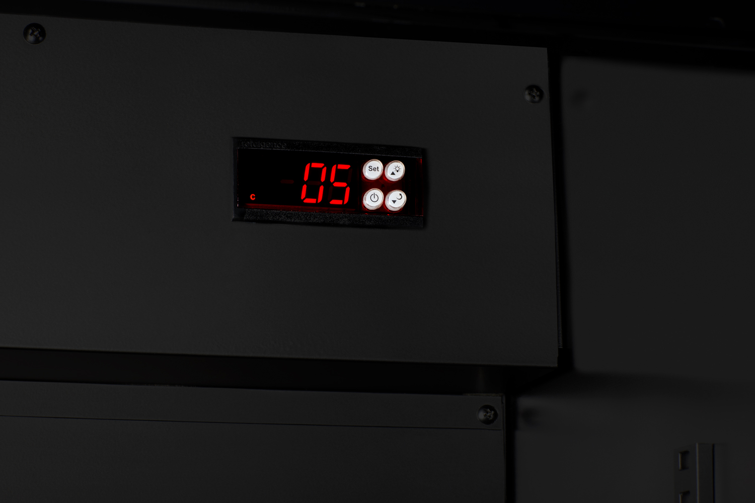 Countertop, shallow depth single-zone commercial refrigerator for freestanding use with French glass doors, black cabinet, front locks, digital controls, and LED lighting